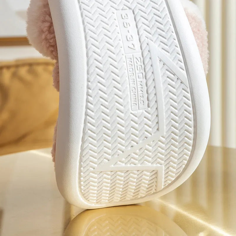 Christmas elk winter home slippers in pink with suede upper and thickened EVA sole on a cream background