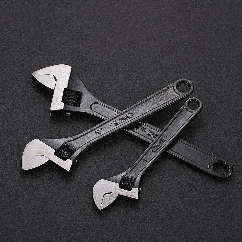 Blackened high carbon steel adjustable open-end wrench spanner showing ergonomic handle