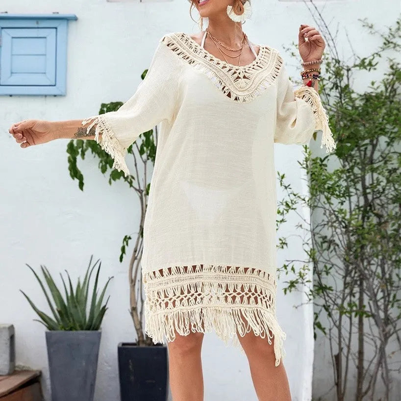 Apricot crocheted knitted patchwork beach dress with half sleeves on a hanger