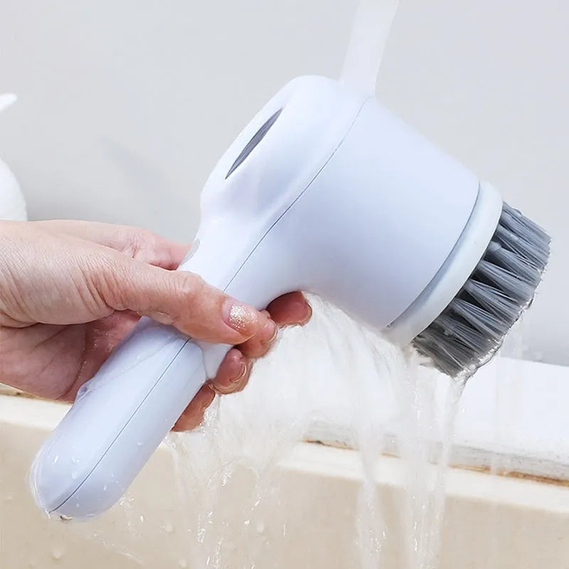 Light grey USB rechargeable electric cleaning brush with multiple interchangeable cleaning heads for kitchen use