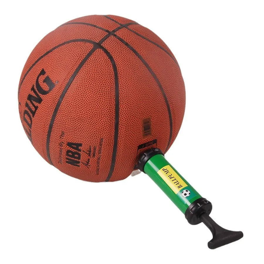 Mixed colour plastic manual hand pump for sports balls on a white background