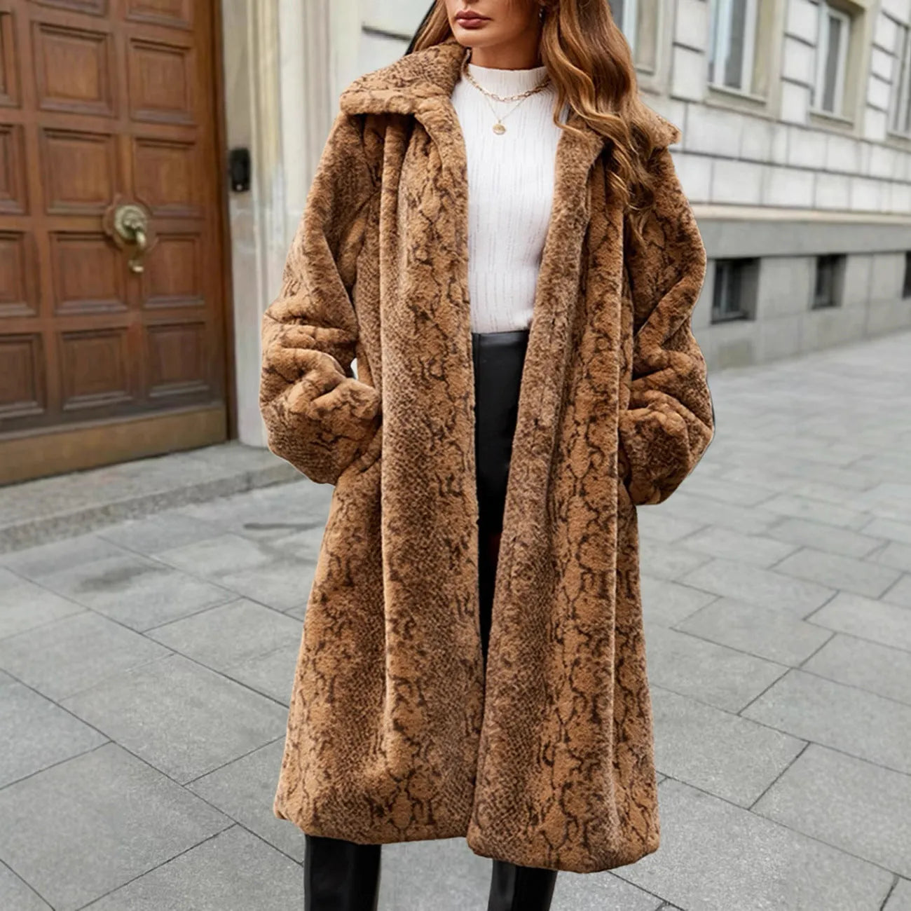 Women's brown leopard print faux fur over-the-knee coat on a model.