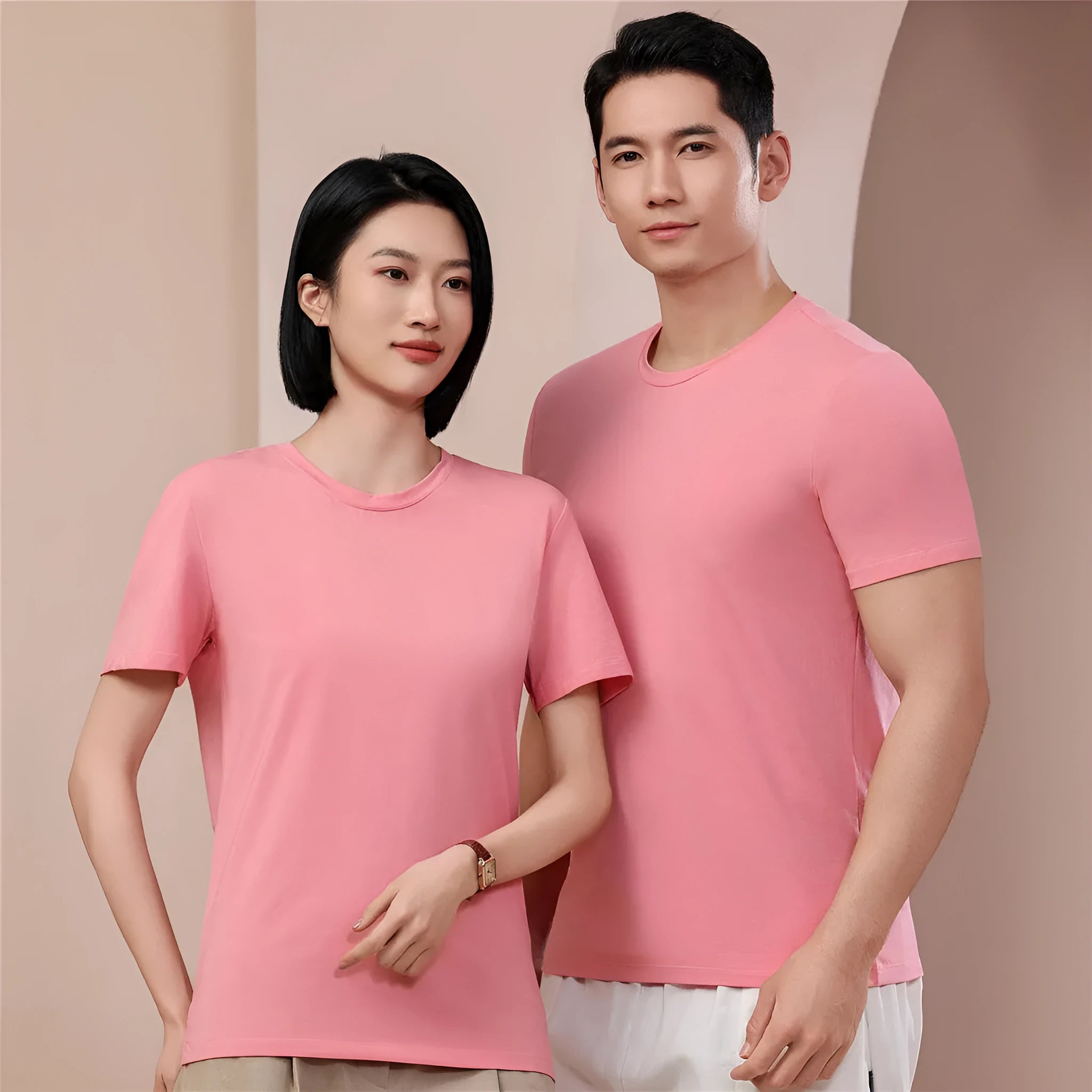 Mercerised modal short sleeve T-shirt in grey green colour on a hanger, showing round neck and plain weave fabric.