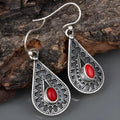 Silver water drop earrings with red pine gemstone on zinc alloy backing