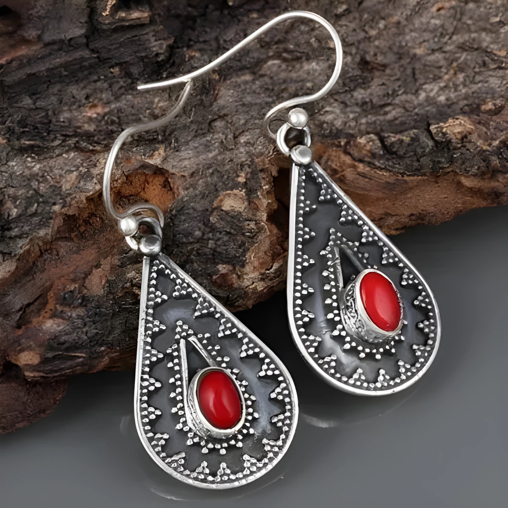 Silver water drop earrings with red pine gemstone on zinc alloy backing