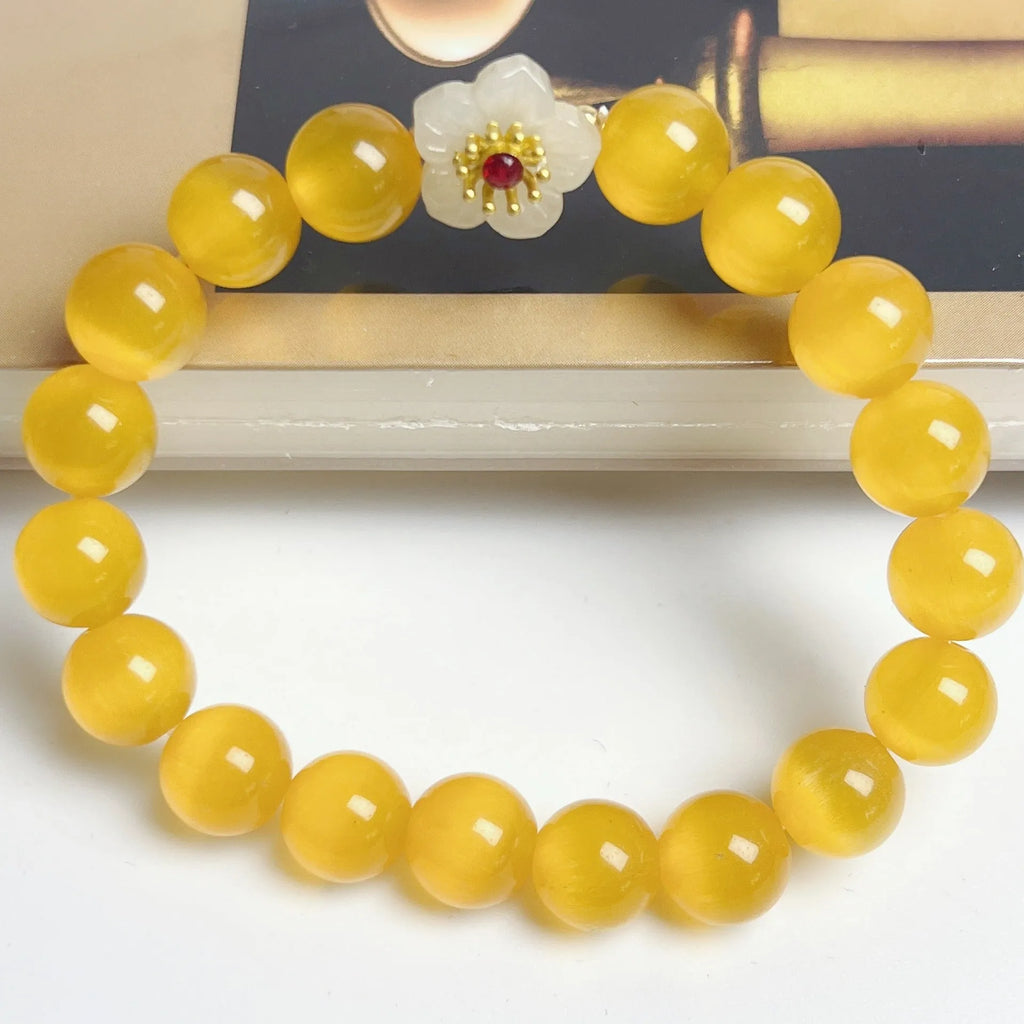 Handmade glass beaded bracelet with floral design in yellow, pink, white or green colour options