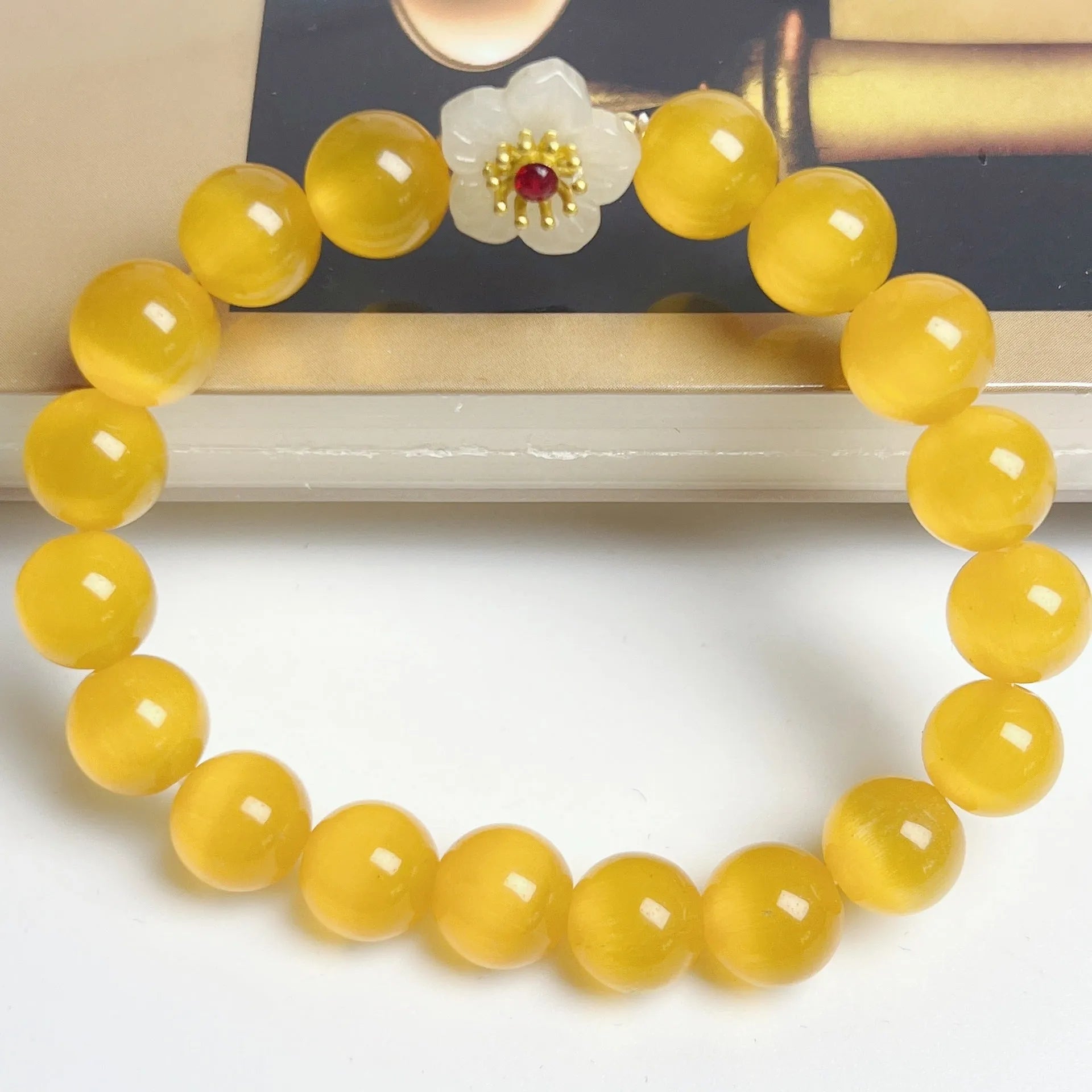 Handmade glass beaded bracelet with floral design in yellow, pink, white or green colour options