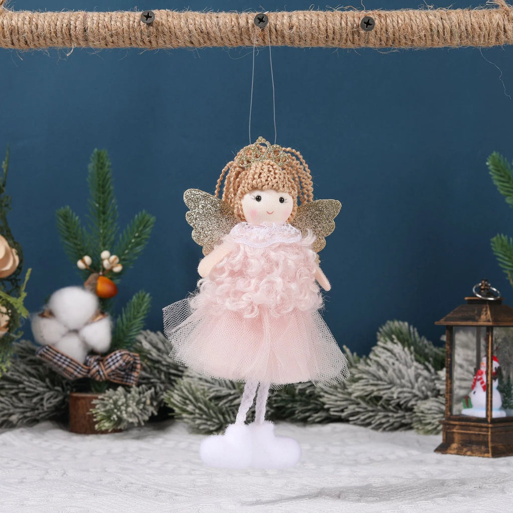 Cartoon angel cloth hair pendant on a girl's high ponytail in white, pink, and khaki colours.