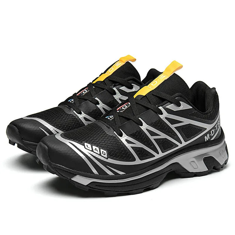 Men's and women's low-top outdoor hiking shoes in khaki with lace-up front and rubber sole.