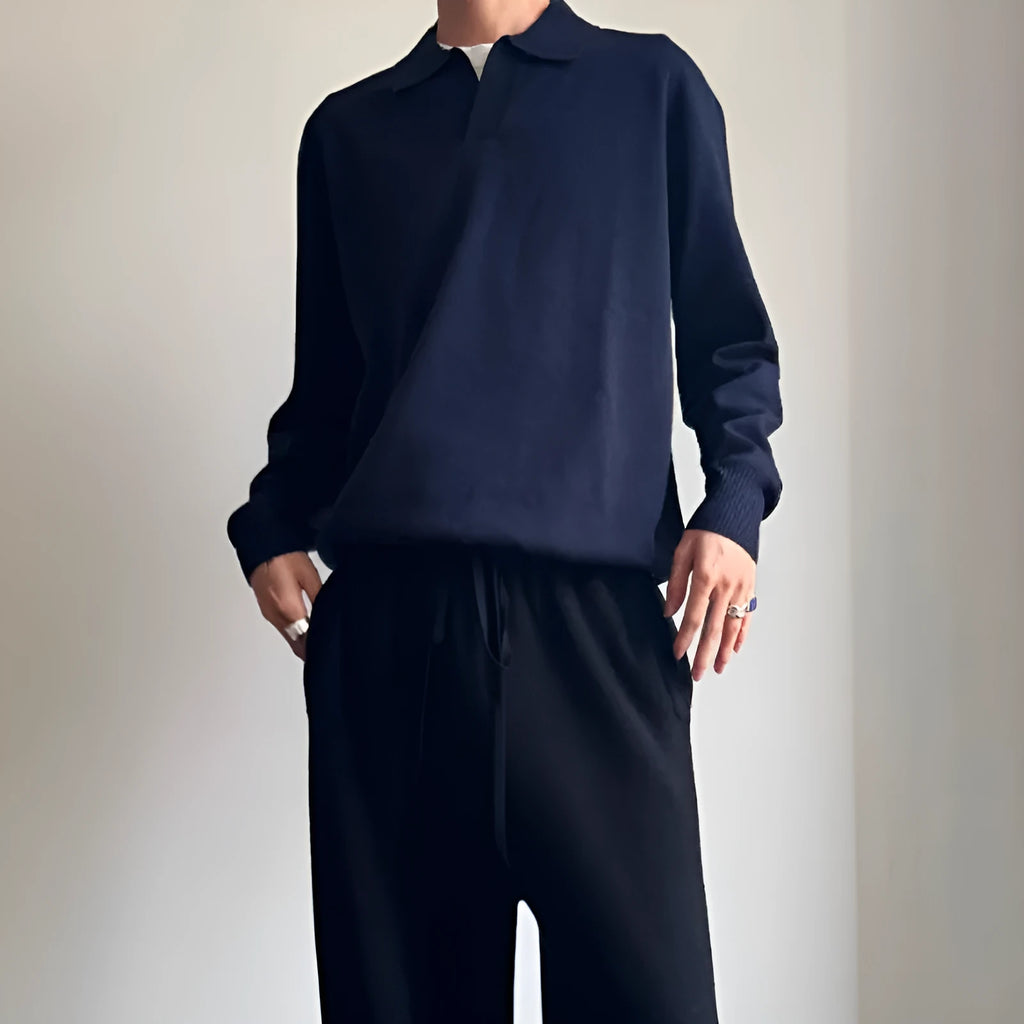 Man's pure wool polo sweater with a lapel collar in loose fit, shown in Milky White colour.
