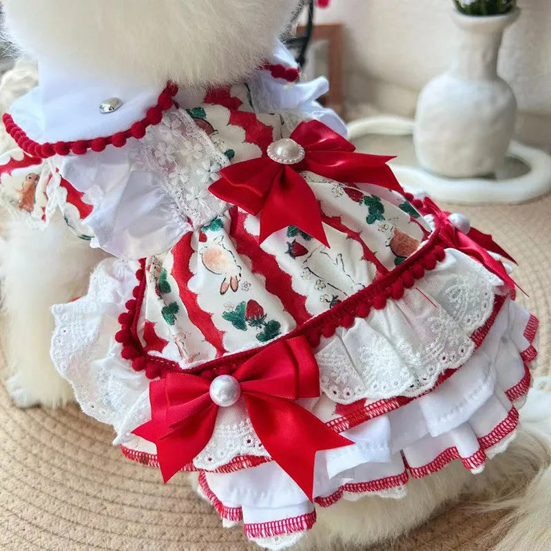 Small white dog wearing a rabbit skirt-style princess dress, showcasing the fit and lightweight polyester material.