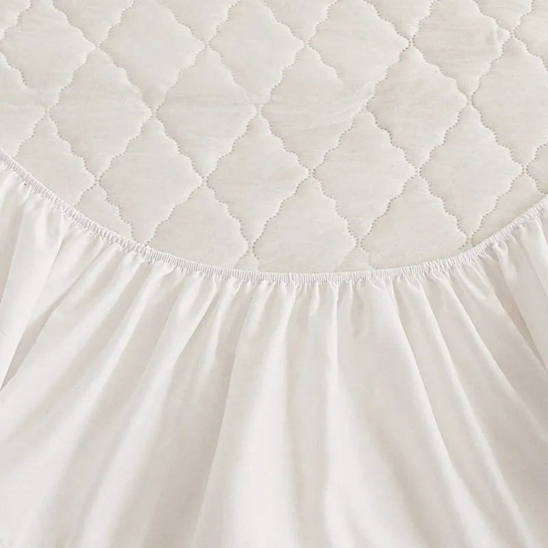 Diamond lattice quilted waterproof mattress protector set with bamboo fibre sheet and pillowcases for a 0.9m bed.