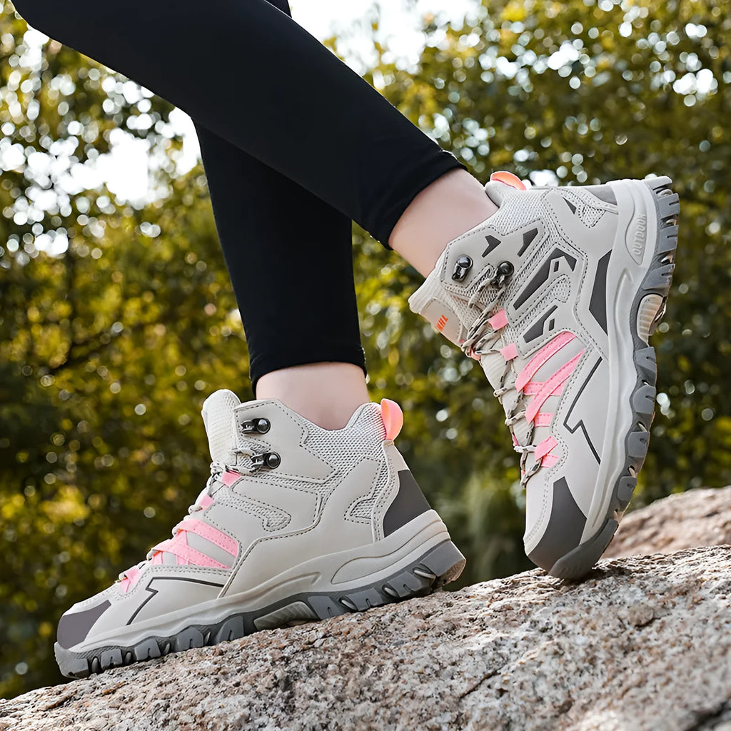 Low-top lace-up hiking sneaker in multiple colours with a flannel upper and rubber sole.