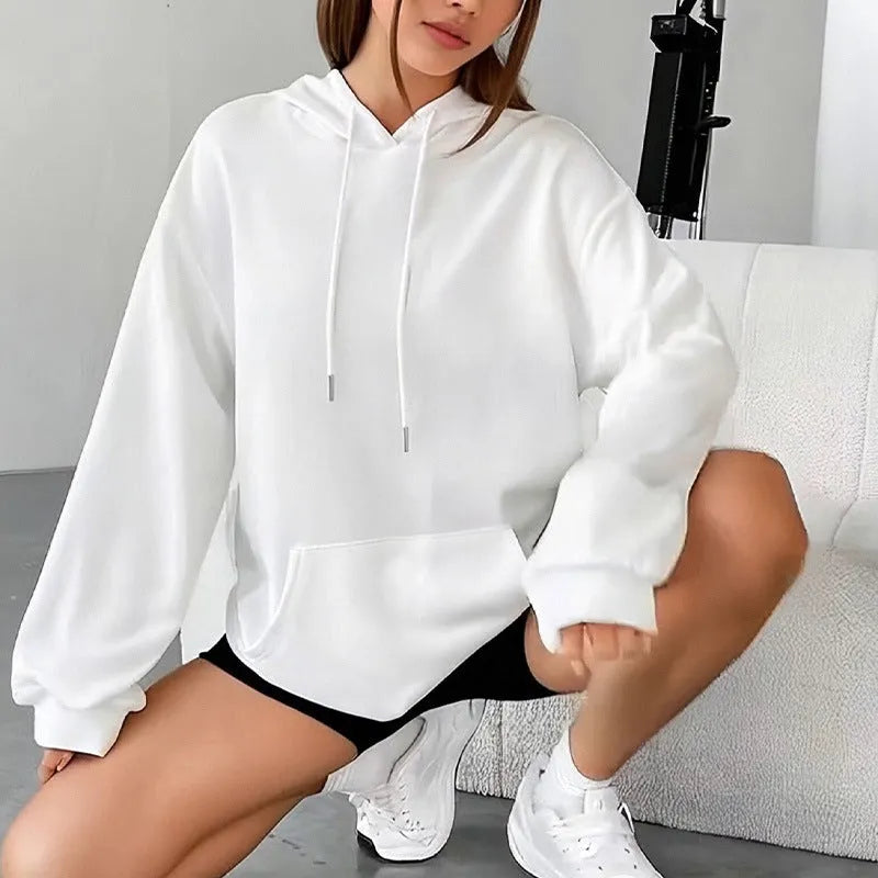 Women's loose grey drawstring pocket sweatshirt on a hanger showing front detail.