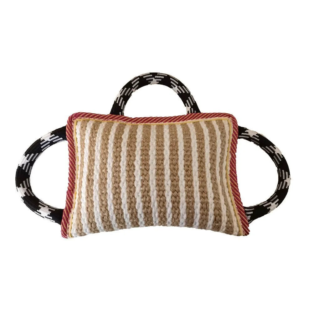 Jute dog tug toy with three rope handles and a central bite pillow for interactive play.