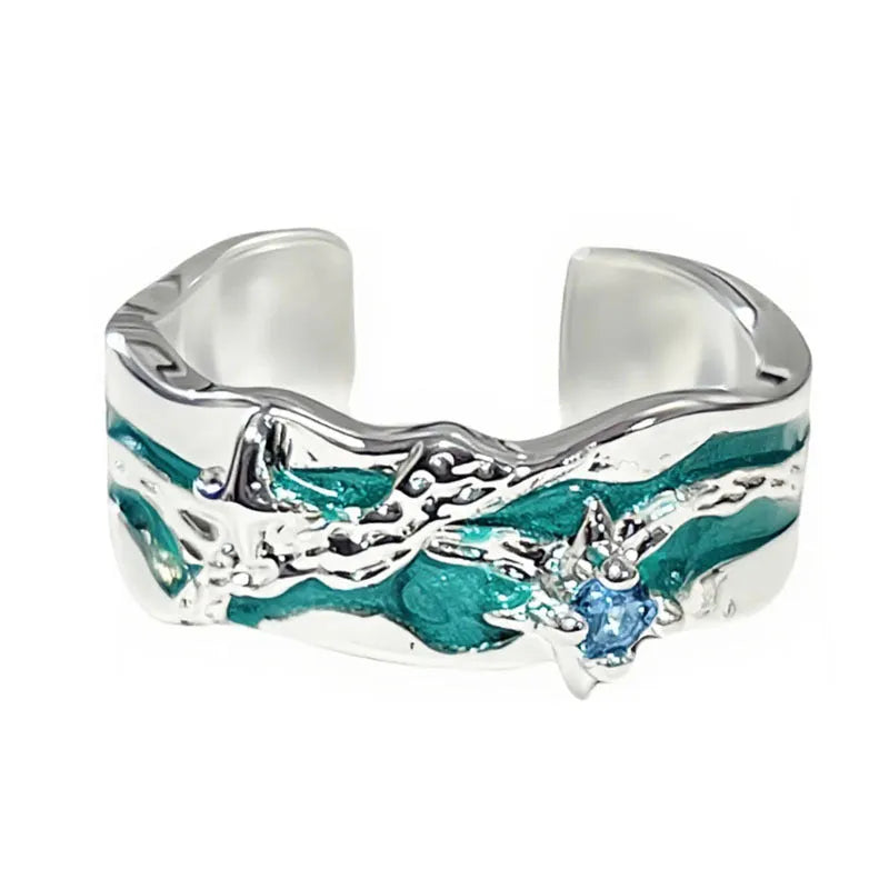 Mint green enamel copper ring with asymmetric folding design and asterism star motif