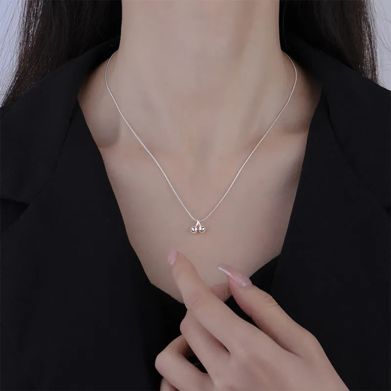 S925 sterling silver cherry pendant necklace on a snake bone chain, adjustable length.