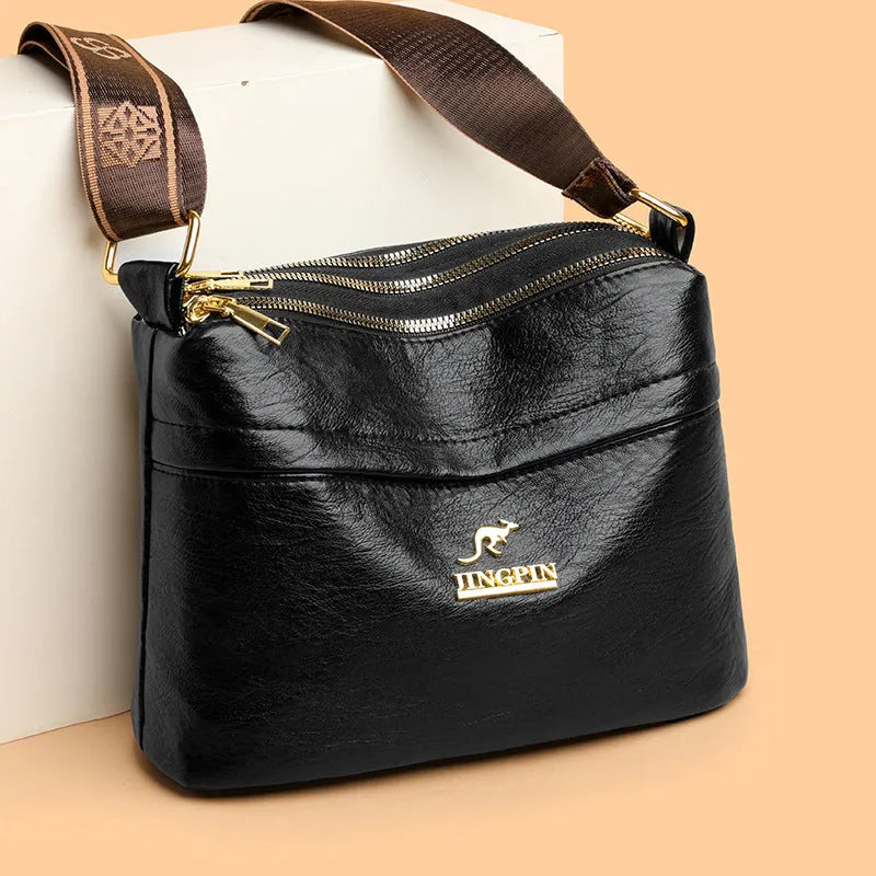 Brown PU leather cross body messenger bag with multiple compartments and sandwich pockets