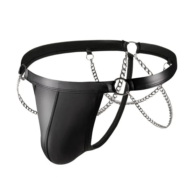 Men's black patent leather thong shorts with a metallic chain detail on the front.