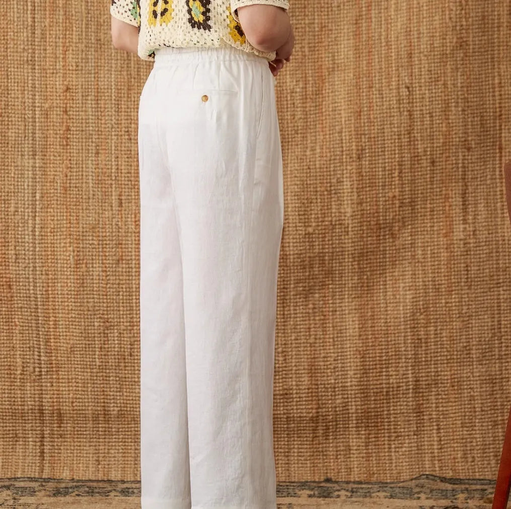 Linen high waist straight-leg trousers with elasticated waistband in greige colour.