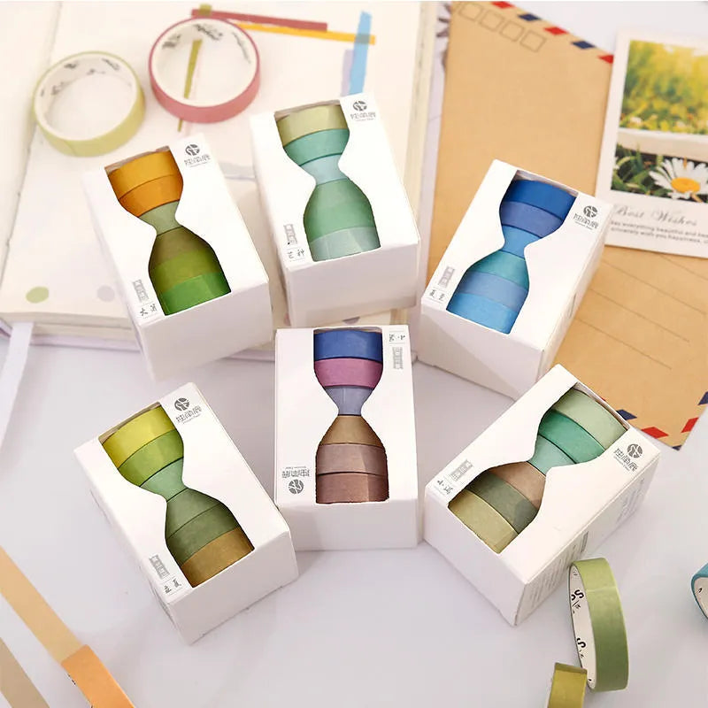 Six rolls of solid-colour 9mm ledger tape with labels showing solar term names like Start of Spring and Autumn Equinox
