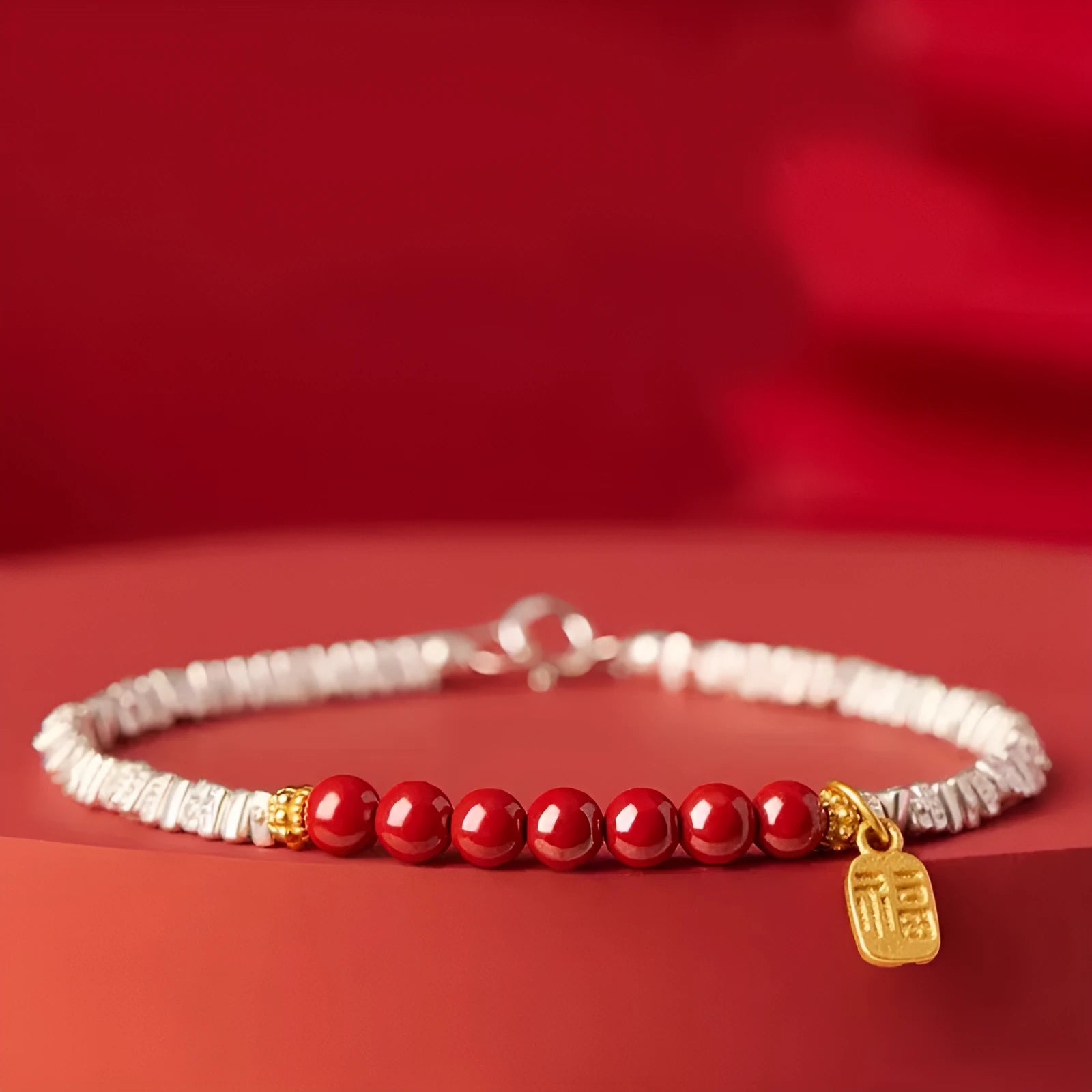 Silver electroplated couple bracelet with small geometric lucky beads measuring 16 cm