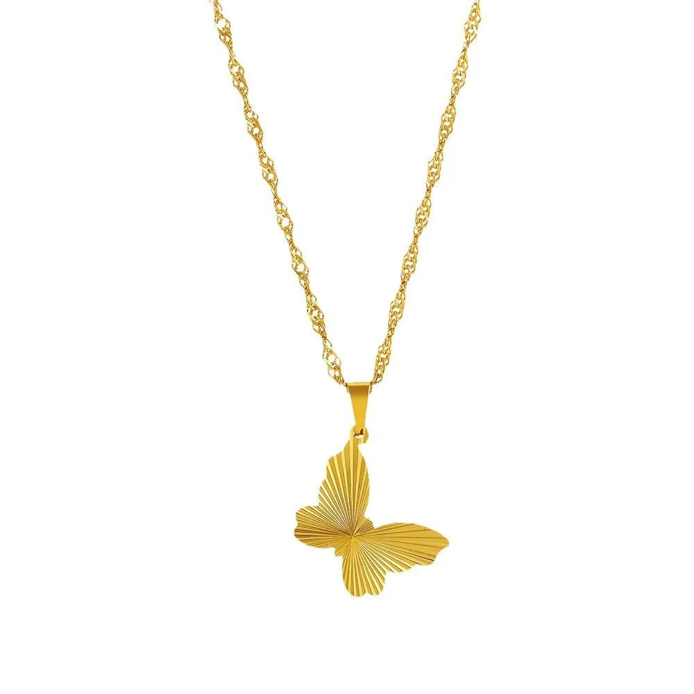 18K gold plated necklace with water wave chain and a choice of heart, bow, round, or square butterfly pendant.