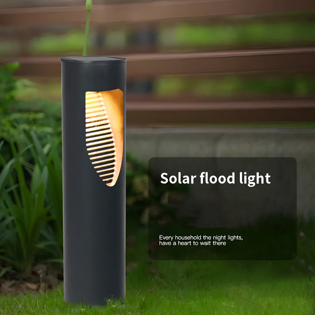 Black geometric solar-powered outdoor garden light with abstract design.
