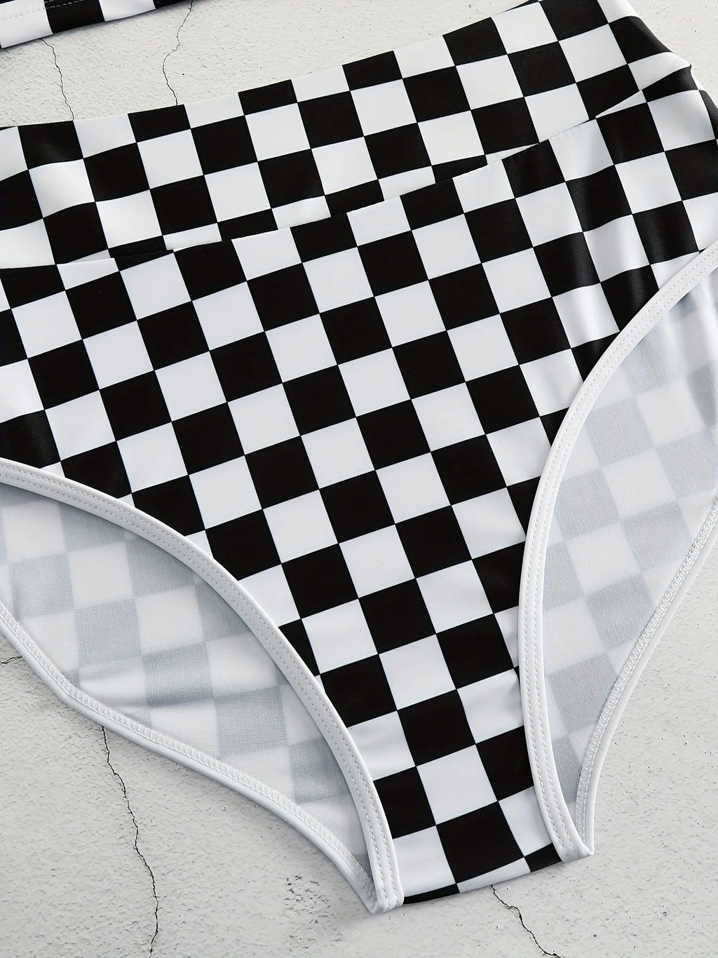 Women's racing one-piece swimsuit with suspender straps and chessboard pattern