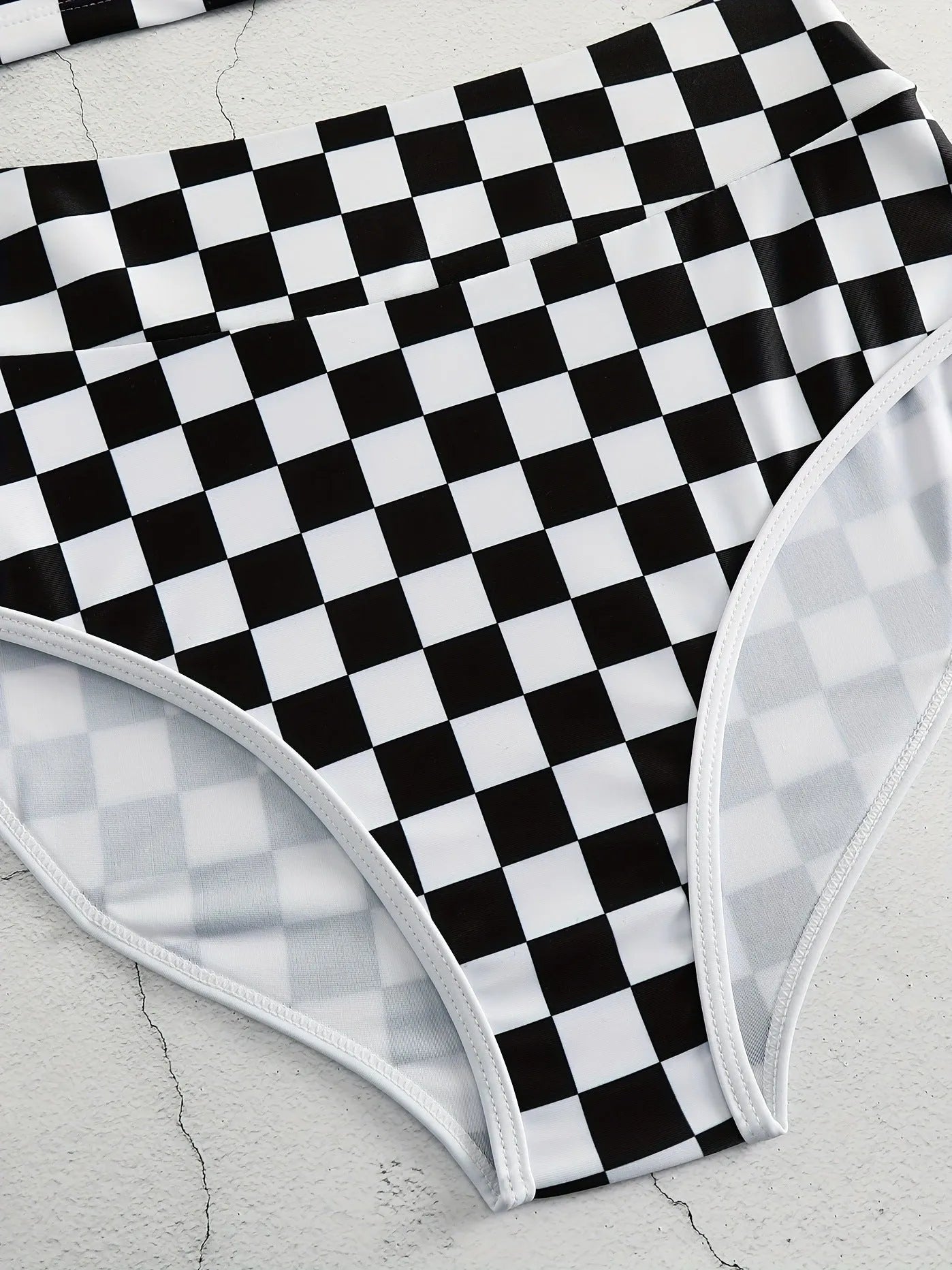Women's racing one-piece swimsuit with suspender straps and chessboard pattern