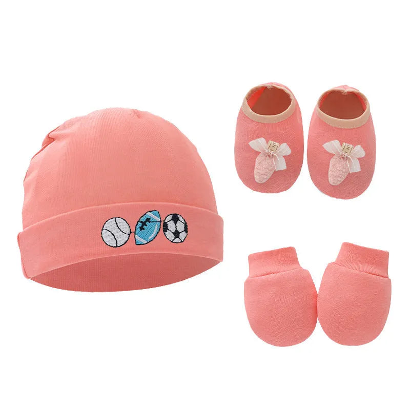 Set of white, light blue, and grey cotton baby pullover caps, gloves, and foot covers for infants.