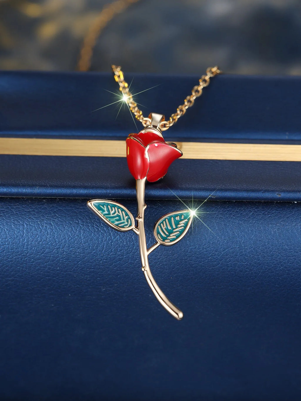 Close-up of a champagne gold rose-shaped copper pendant on an O-ring chain, with adjustable 41-50cm length.