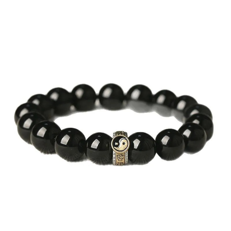 Black stone single ring bracelet for men and women on a wrist, showing 10mm and 12mm size options.