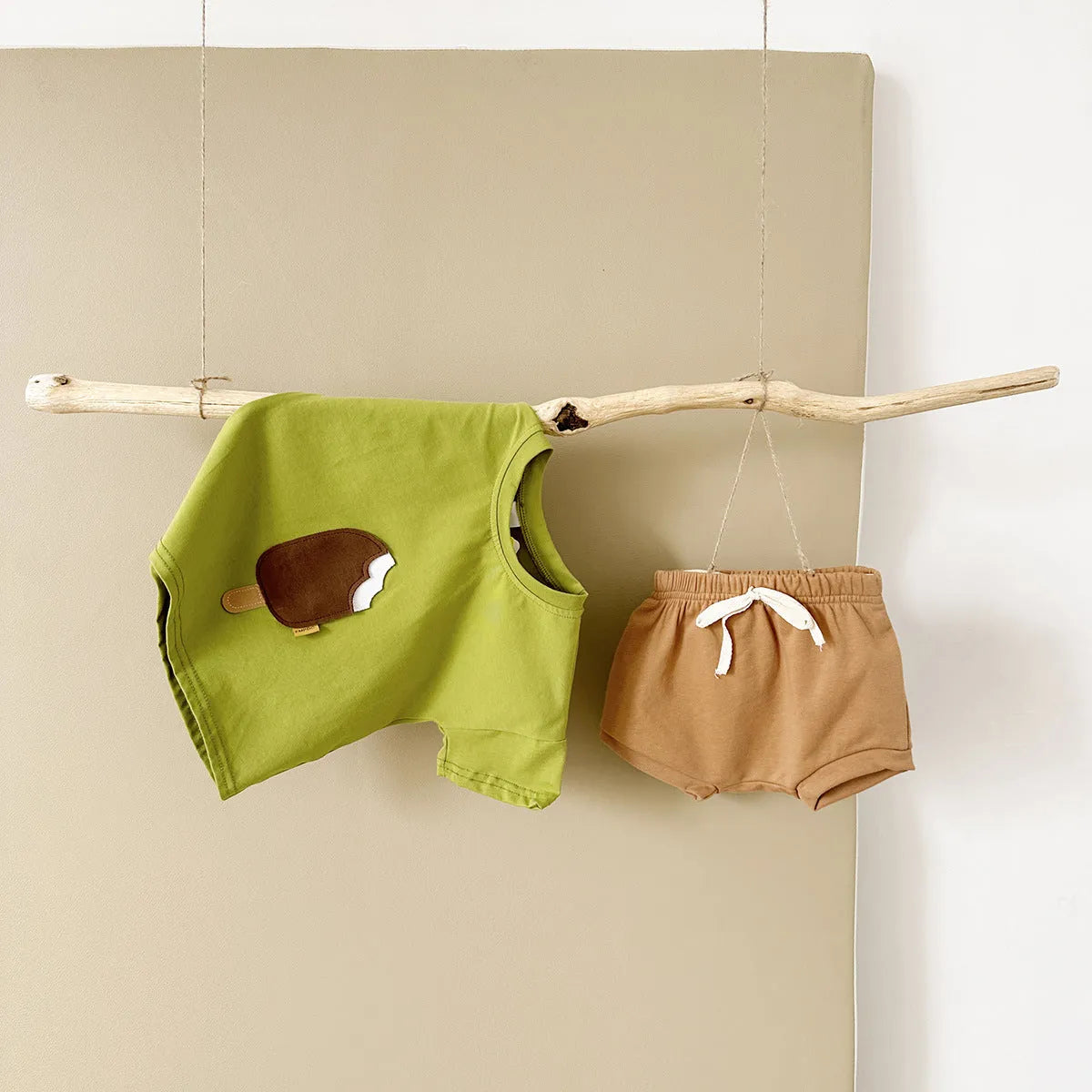 Girls' apricot cotton shorts suit two-piece set with ice cream patch on shirt.