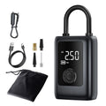 Car portable electric gas filling bag air pump with tyre pressure gauge and LED light on a dark background