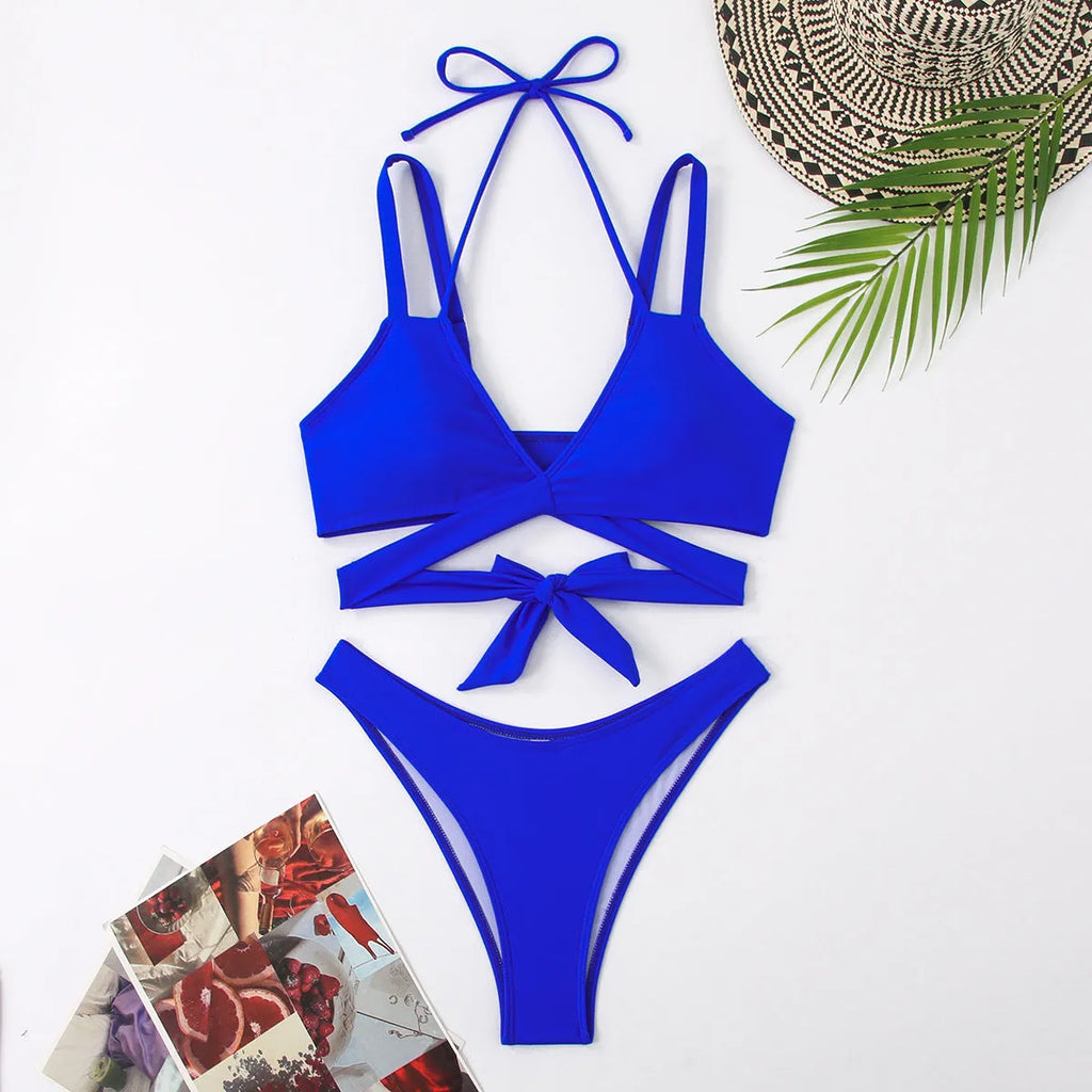 Women's solid colour strap bikini swimsuit on a mannequin, shown in black.