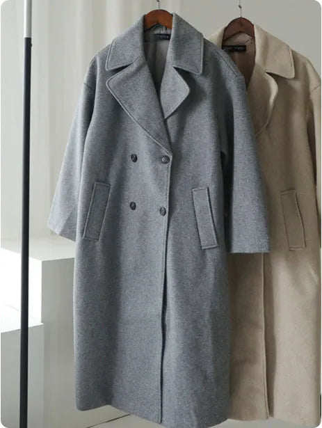 Gray mid-length double breasted woolen coat for women with button front and loose fit
