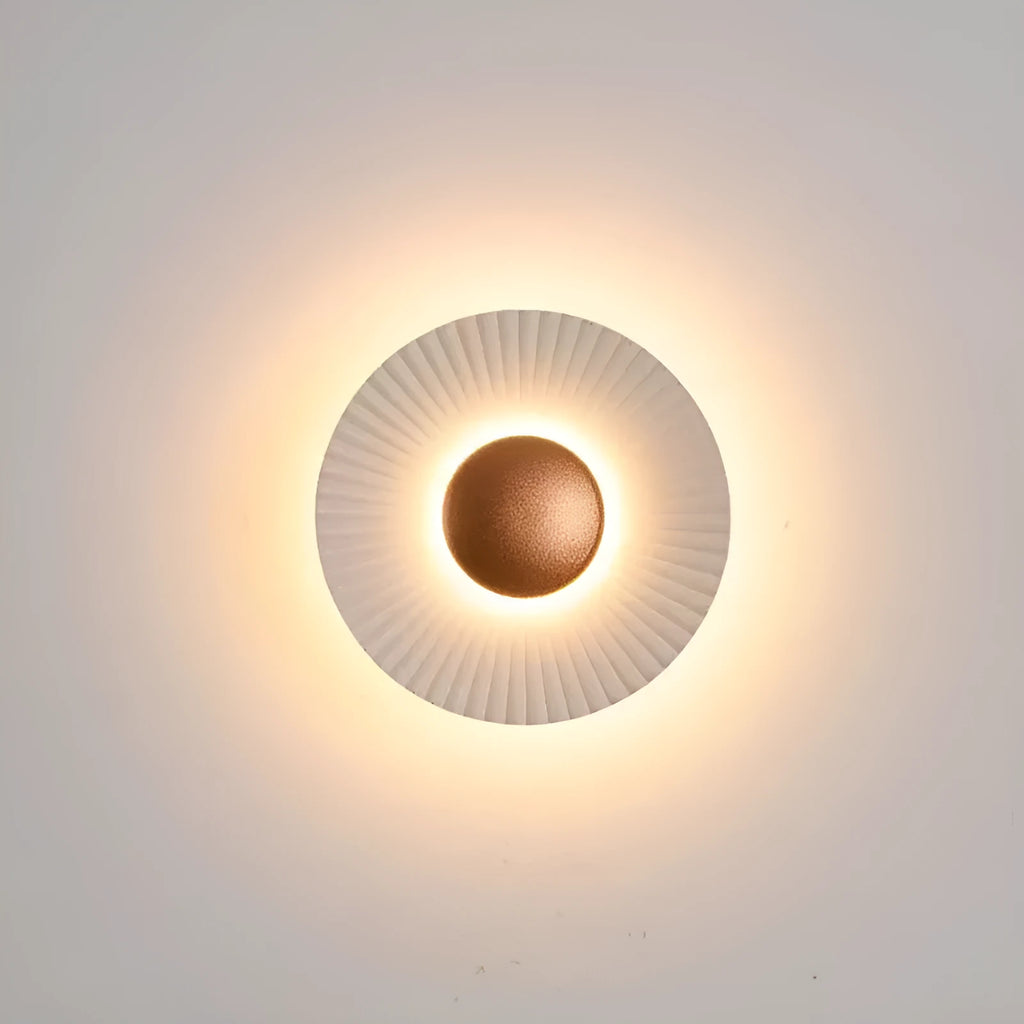 Round wall-mounted LED light with aluminium shade in a gold and white two-tone colour option.