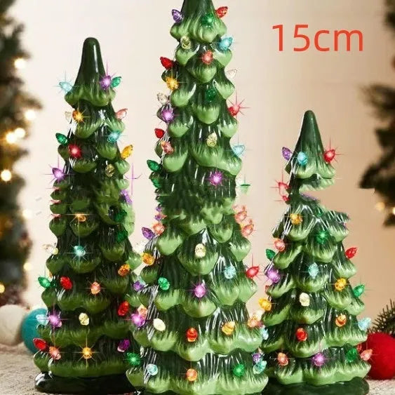 A resin Christmas tree decoration with lights, shown in a European style, suitable for indoor or courtyard use.