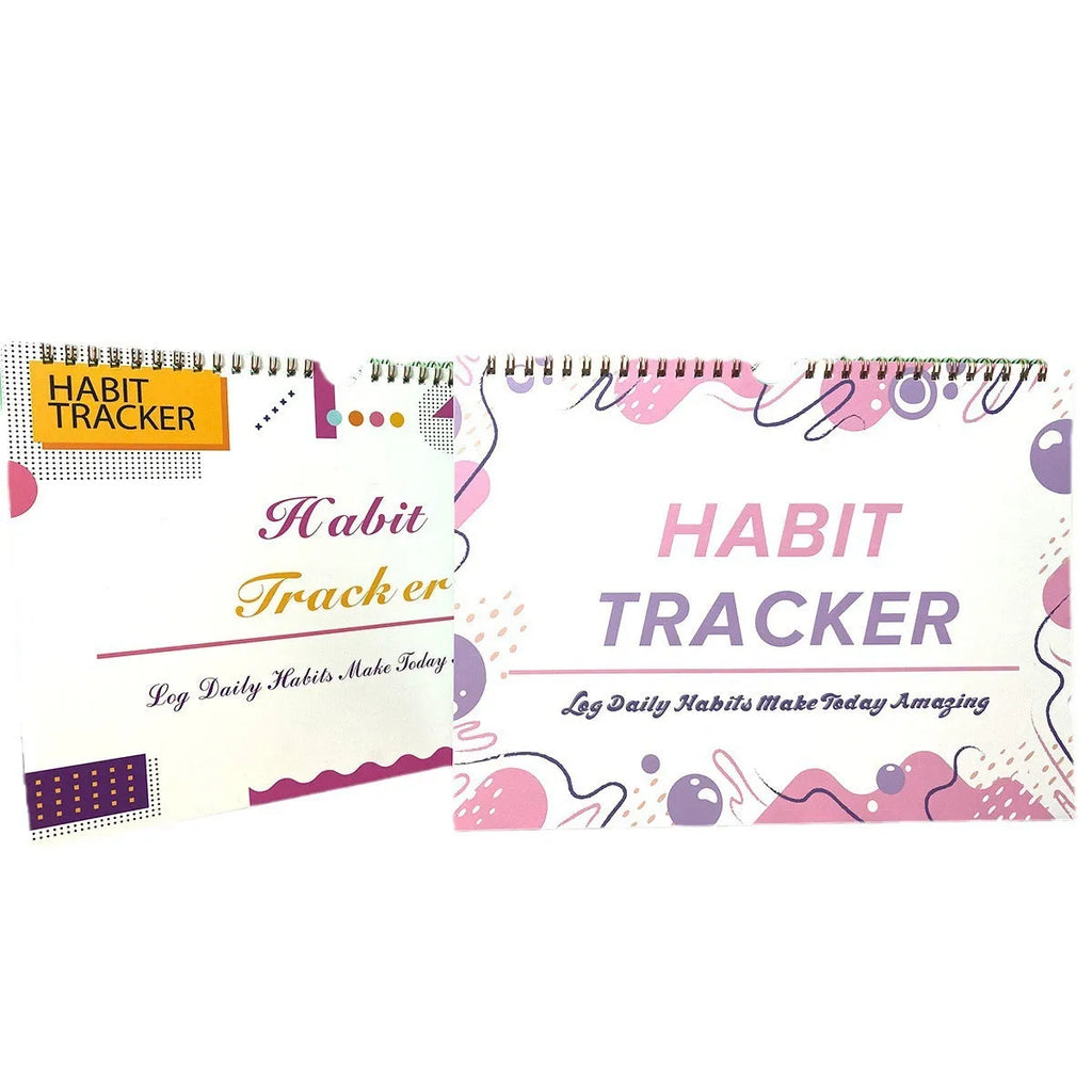 A5 habit tracking notebook open on a desk, showing internal pages, available in four colour options.