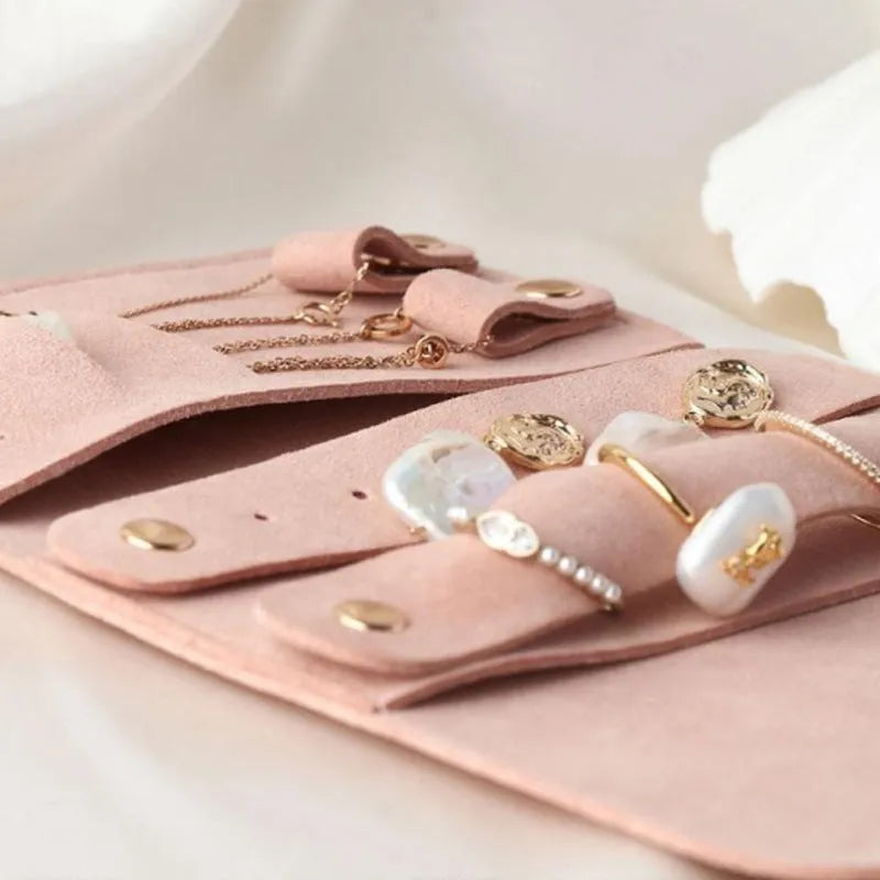 Brown soft microfiber PU leather jewelry storage bag measuring 12x12 cm for earrings and watches.