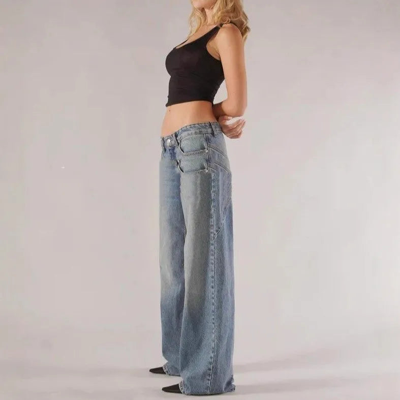 Women's blue cotton wide leg mop trousers with low waist and spliced stitching detail.