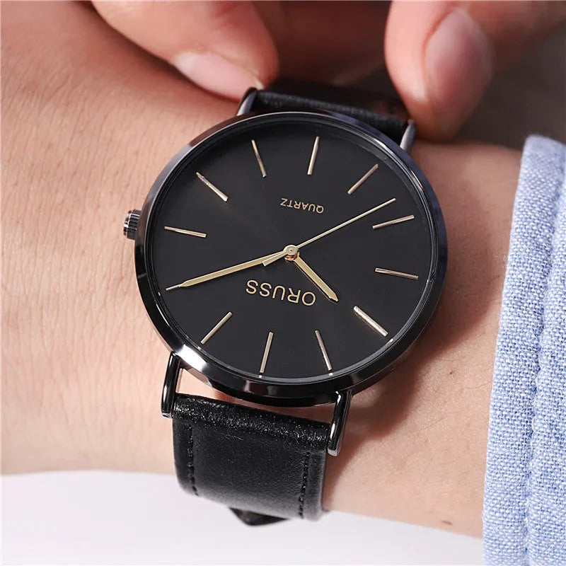 Men's ultra-thin quartz belt watch with alloy case, mineral glass mirror, black dial, and leather-style strap