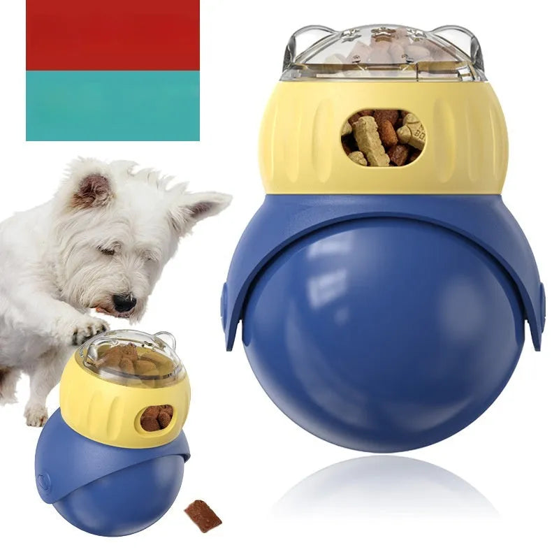 Yellow and blue Tumbler Owl interactive cat feeder toy on a wooden floor