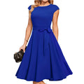 Sleeveless black party dress with lace-up waist tie and oversized swing skirt