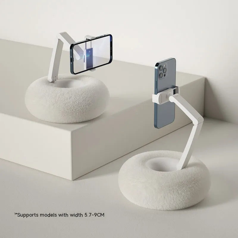 Rotating phone and tablet bracket with adjustable clamp extended vertically on desk