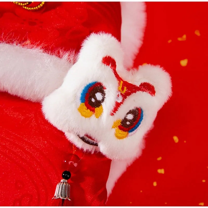 Red lion dance pet dog vest with 3D lion head ornament and golden buttons on white background