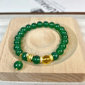 Natural green chalcedony and red agate wealth snake bracelet with copper geometric details.