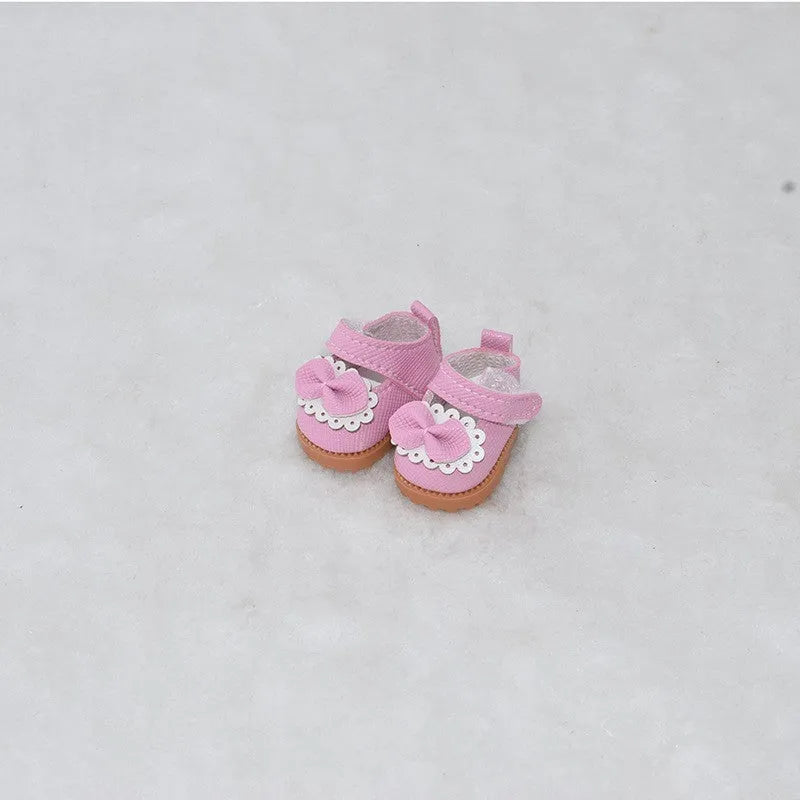 A pair of polyurethane doll shoe accessories for a 17cm figure, shown in a selected style and colour.