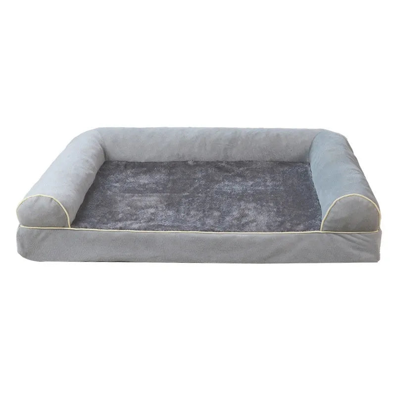 A dark grey, rectangular sponge dog bed with a removable cloth cover, shown inside a metal wire crate.